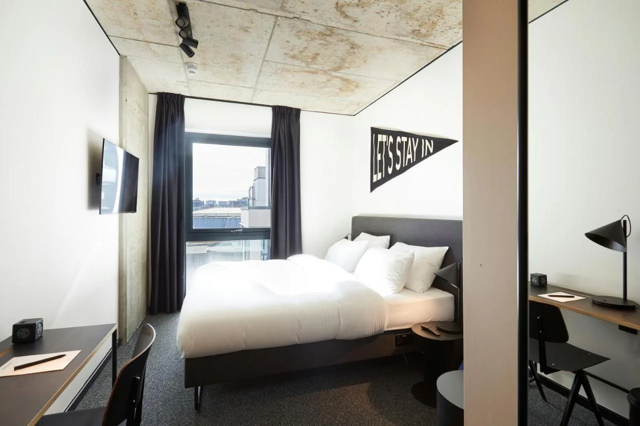 Hotel room with bed and desk at The Social Hub Glasgow